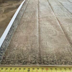 Beautiful neutral backdrop tan goes into a darker green gray color with black.